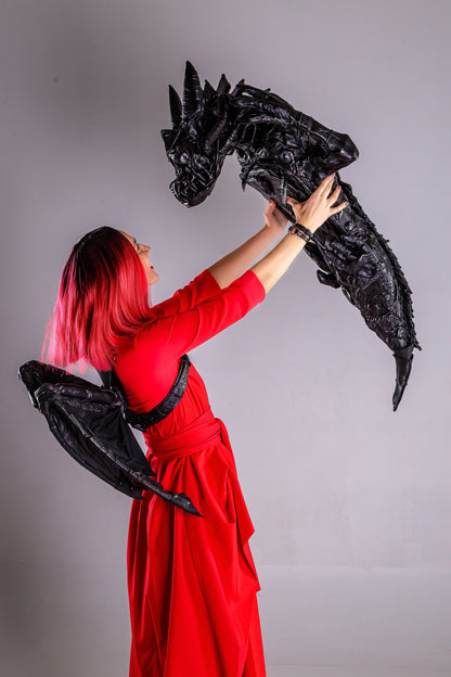 Dragon backpack with removable wings.  Artistic bronze buckles. Leather own scale print. Option  wearing wings separately. American version.