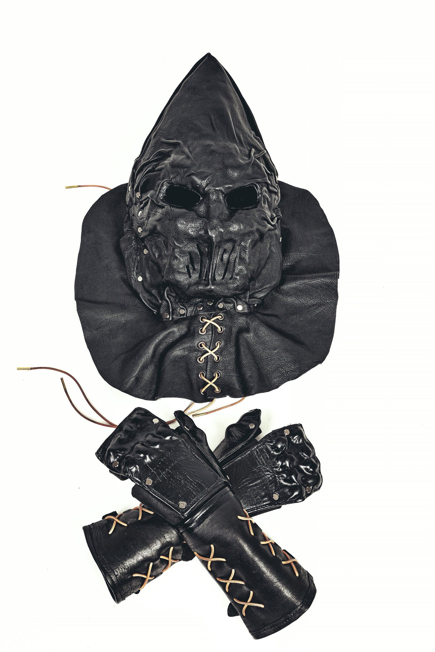 Black Leather Executioner Hood with special cutouts opposite the mouth and ears and Black Leather Gauntlets: A Dark and Enigmatic Set